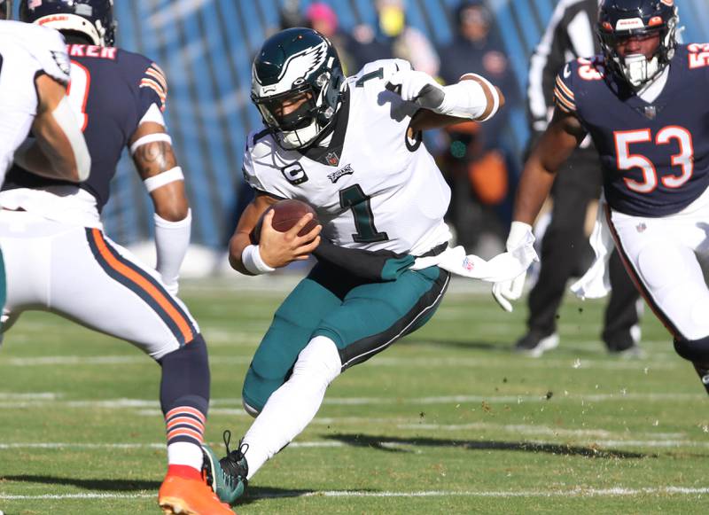 Philadelphia Eagles quarterback Jalen Hurts finds a hole in the Bears defensive line during their game Sunday, Dec. 18, 2022, at Soldier Field in Chicago.