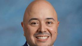 McHenry High School teacher selected as finalist for Golden Apple Award