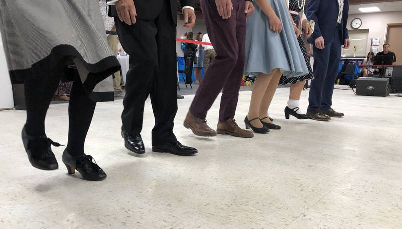 Couples line up to learn how to swing dance at the McHenry County Historical Society and Museum's Victory Dance Saturday, Sept. 13, at the McHenry VFW Post 4600.