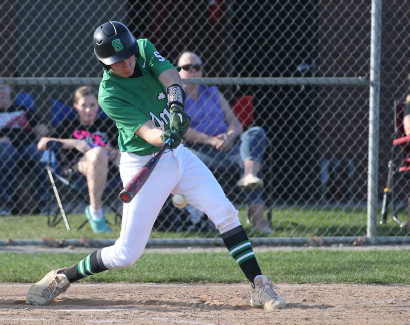 Seneca's Calvin Maierhofer makes contact with a ball against Putnam County on Thursday, April 13, 2023 at Seneca High School.