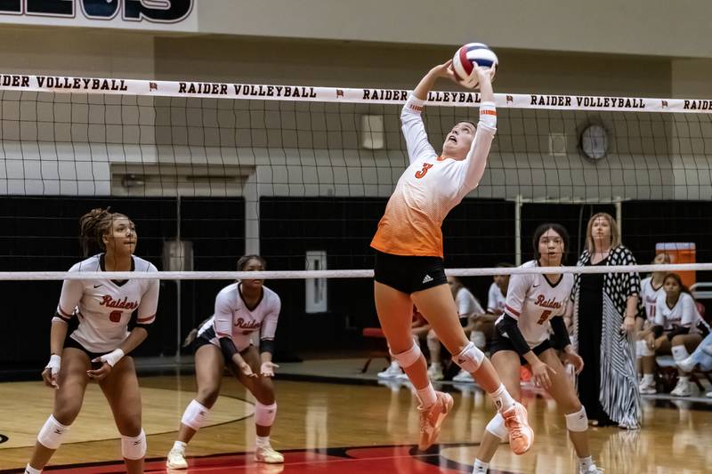 Minooka's Kennedy Walker sets up a teammate during a varsity volleyball away game against Bolingbrook on Sept. 25, 2025.