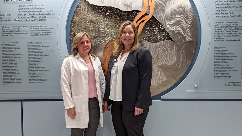 Lightways Hospice and Serious Illness Care in Joliet has a serious illness care program for people with advanced, chronic or life-limiting illnesses.
Nicole Hartley, lead nurse practitioner for Lightways’ serious illness care program (left) and Lisa Heiy, director of Lightways’ serious illness care (right) pose in front of the donor wall on Monday, March 4, 2024, at Lightways in Joliet.
