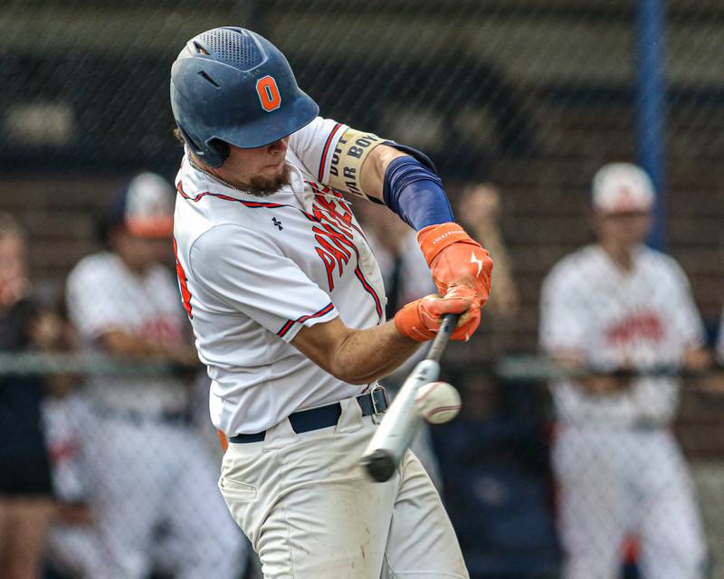 Oswego's Cade Duffin (23) connects on a pitch during Class 4A Romeoville Sectional semifinal game between Plainfield North at Oswego.  June 1, 2023.