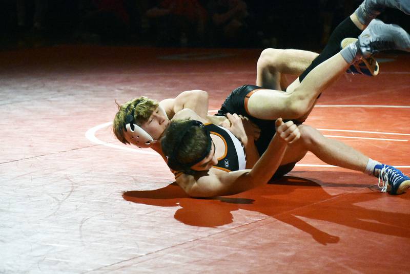 Marian Central’s Brayden Teunissen controls Sandwich’s Jakob Gruca during the IHSA Class 1A Dual Sectional at Oregon on Tuesday, Feb. 25, 2025 in Oregon.