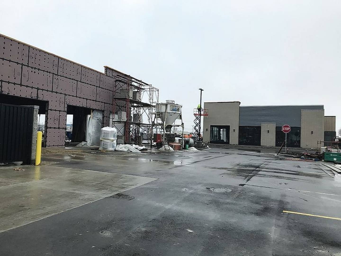 Work continues on a Chipotle restaurant, left, and another building to house a Starbucks coffee shop Tuesday, Feb. 22, 2022, in the Lakemoor Commons shopping center at routes 12 and 120.