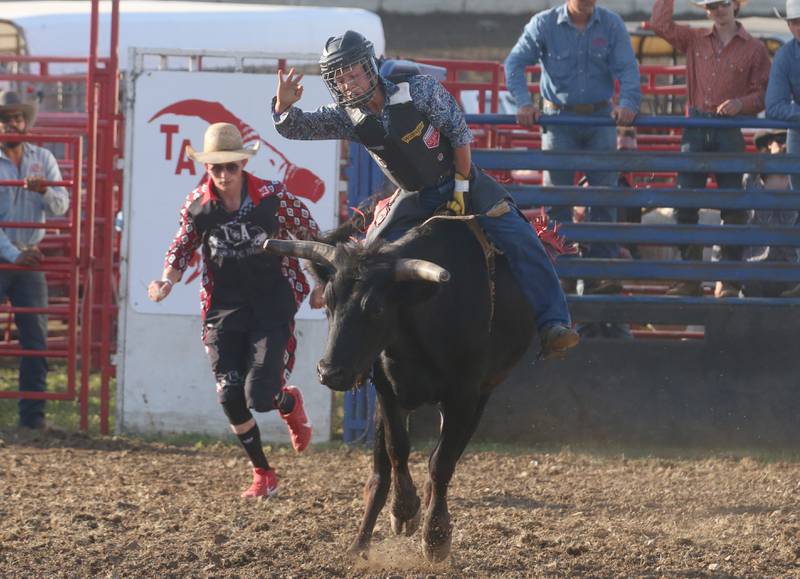 Tucker Breen of Yorkville, rides a bull during the inaugural Starved Rock Rodeo on Saturday, June 21, 2025 at the La Salle Speedway.