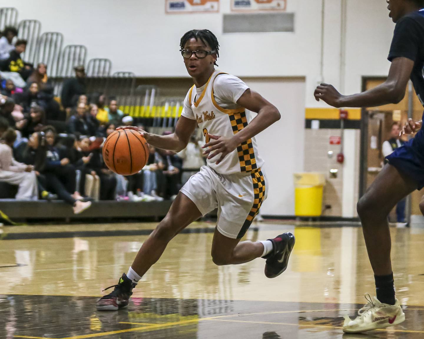 Joliet West's Elijah Wilson (2) makes a move to the basket during their basketball game between Plainfield South at Joliet West, Feb 2, 2026 in Joliet.