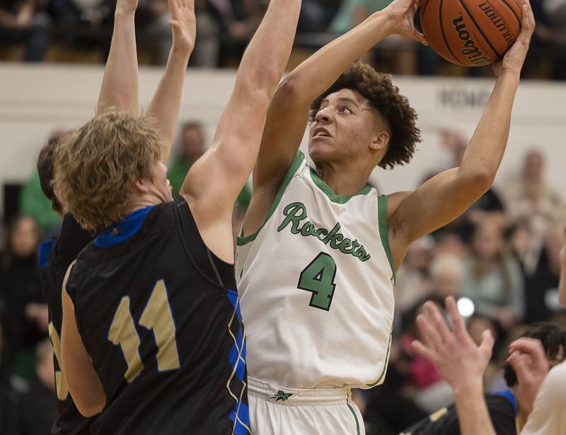 Rock Falls’ Devin Tanton-DeJesus puts up a shot against Rockford Christian’s Brody Carlson Tuesday, Jan. 30, 2024 at Rock Falls High School.