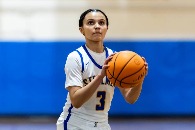 Joliet Central's Nevaeh Wright shoots a free throw during a varsity girls basketball game against Romeoville at Joliet Central on Dec. 18, 2025.