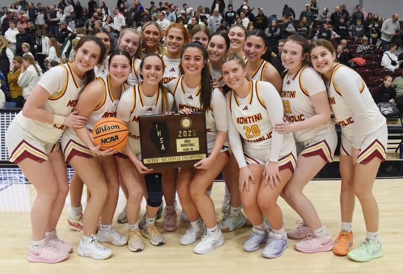 Montini players pose with their trophy after defeating Grayslake Central 51-45 during the Hersey Class 3A supersectional on Monday, March 3, 2025 in Arlington Heights.