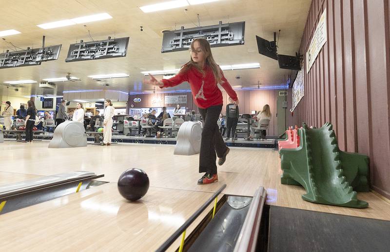 Vivienne Chavira, fifth grader at St. Marys in Sterling, throws the ball down the alley Tuesday, Jan. 28, 2025.