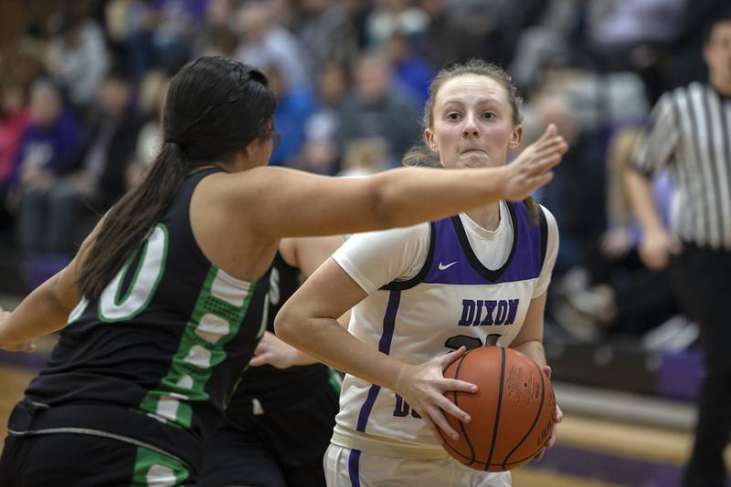 Dixon’s Katie Drew looks to put up a shot against Rock Falls Wednesday, Feb. 1, 2023.