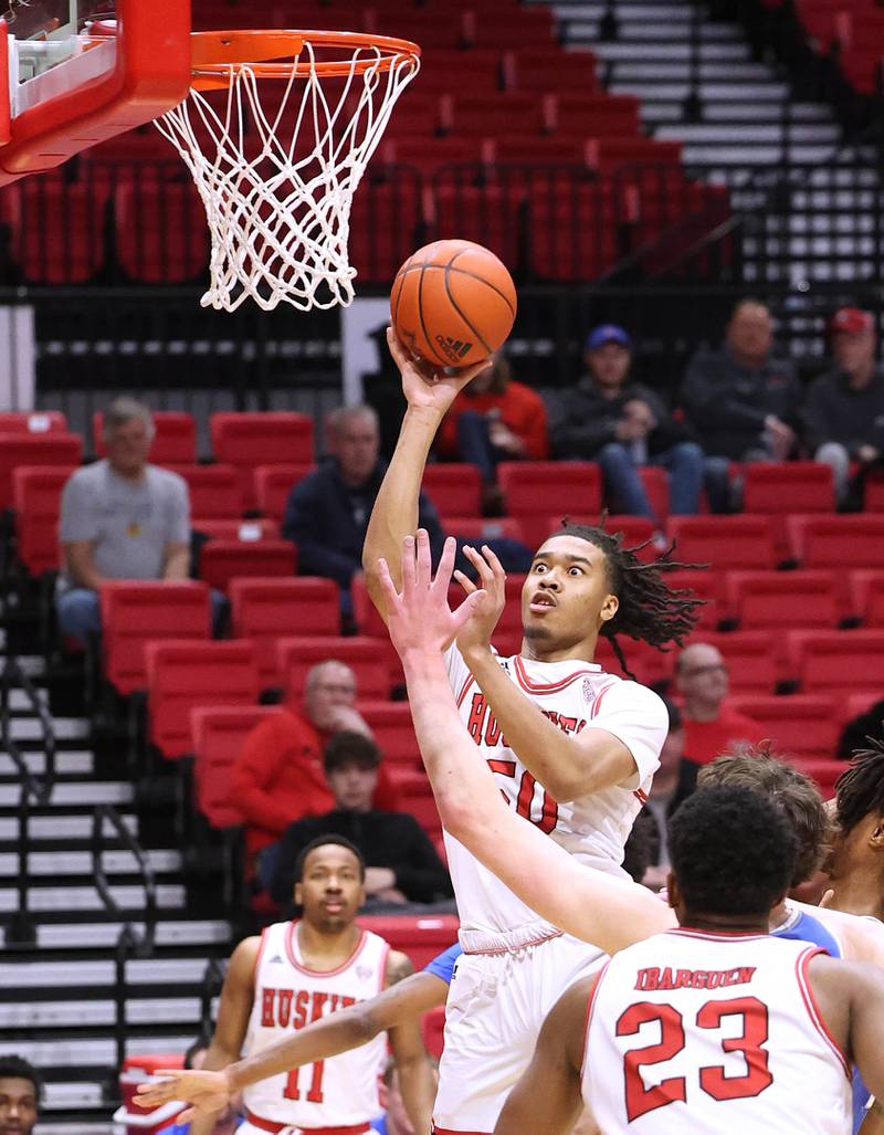 Northern Illinois Huskies guard Anthony Crump gets inside the Buffalo defense Tuesday, Feb. 28, 2023, during their conference matchup at the Convocation Center at NIU.