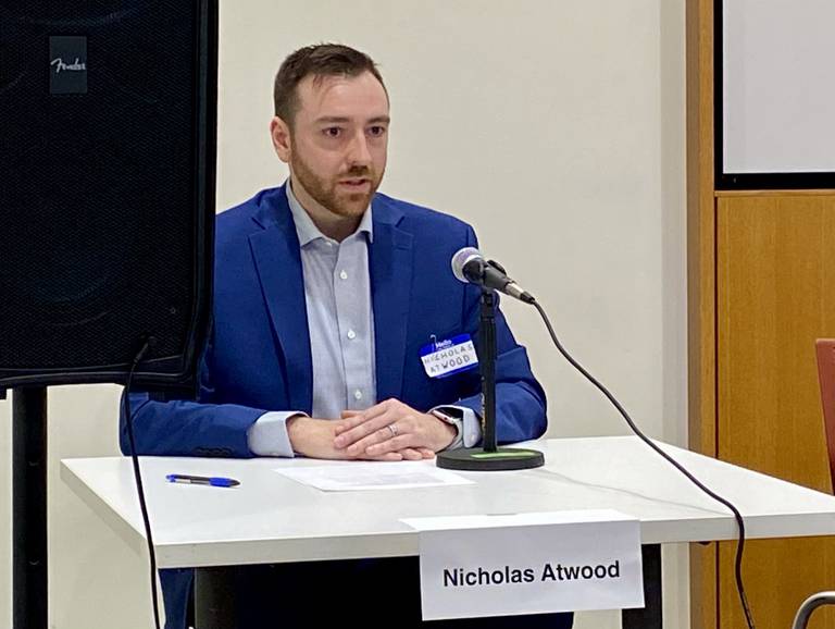 Nicholas Atwood, candidate for DeKalb School District 428 school board, speaks during an election forum hosted by DeKalb Election Group and WNIJ Radio on Sunday, March 9, 2025, at the DeKalb Public Library, 309 Oak St.