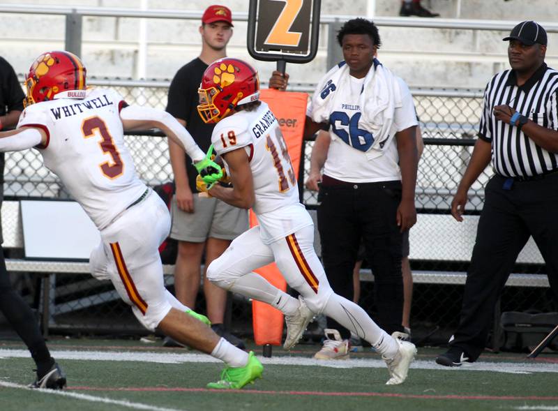 Batavia’s Zach Granberg (19) carries the ball during a game against Phillips at Gately Stadium in Chicago on Saturday, Aug. 27, 2022.