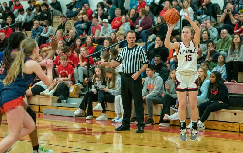 Yorkville's Aliesha Peterson (15) shoots a three-pointer against Oswego during the 13th annual Hoops 4 Hope Communities vs. Cancer basketball event at Yorkville High School on Saturday, Jan 28, 2023.
