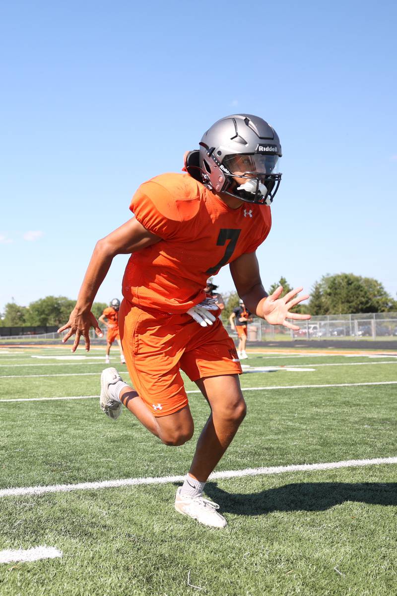 Minooka Inside Linebacker Isaiah Dupree runs a kickoff drill during practice. Wednesday, Aug. 10, 2022, in Minooka.