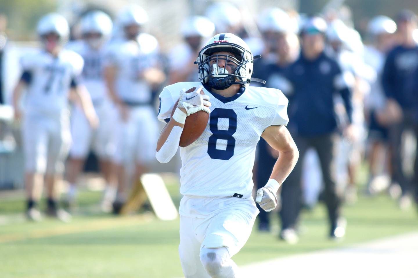 Cary-Grove’s Andrew Prio runs the ball for a touchdown against Highland Park in second-round IHSA Class 6A playoff action at Wolters Field in Highland Park Saturday.