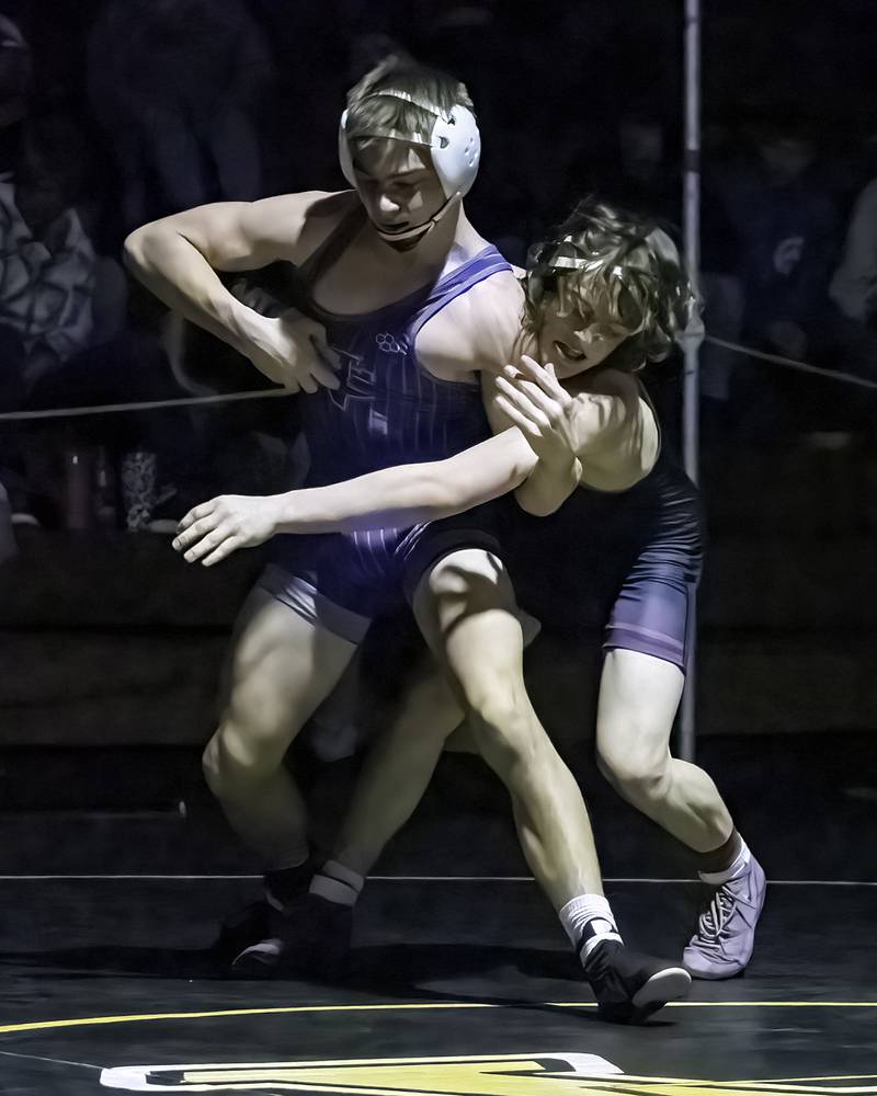 Newman's Brady Grennan (left) tries to escape from Rockridge's Jude Finch during the 126-pound title bout at the 1A Riverdale Regional on Saturday, Feb. 4, 2023.