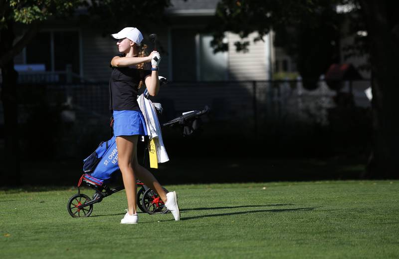 St. Charles North’s Kayla Beu hits from the fairway during the Class 2A Waubonsie Valley Girls Golf Sectional on Monday, Oct. 6, 2025 at Springbrook Golf Course in Naperville.