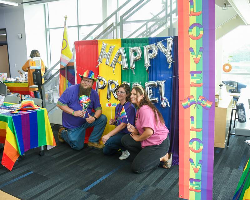 Joh Wohlers, Jessica Kellenberger and Emily McMicken all pose for a photo during the pride party held at Waubonsee Community College at Plano’s campus on Thursday June 29, 2023.