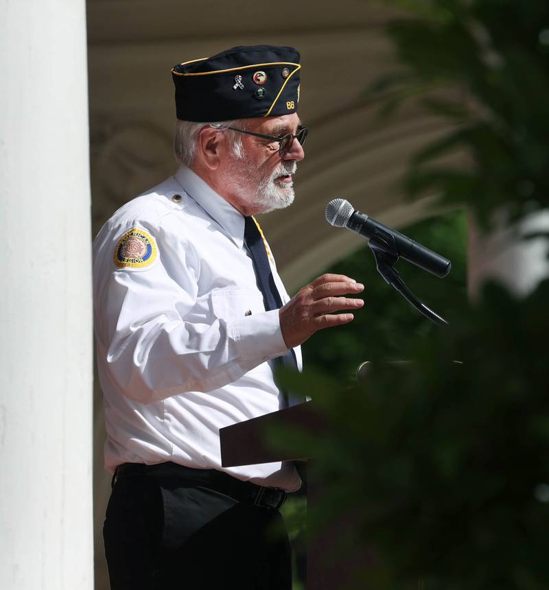 Mike Giuliano, DeKalb American Legion chaplain, gives the invocation Monday, May 26, 2025, during the Memorial Day ceremony at Ellwood House in DeKalb.