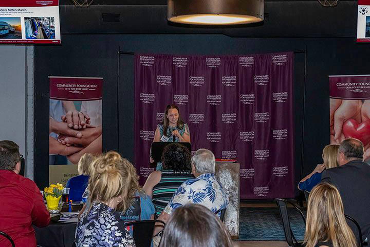 Maddie Bozik, who founded Maddie’s Mitten March when she was just 10, keynoted the Community Foundation of the Fox River Valley’s grantee recognition event on Thursday, July 11, at Society 57 in Aurora. Maddie also received a grant from the Foundation to purchase new tires for her agency’s renovated school buses that transport clothing to underprivileged individuals.