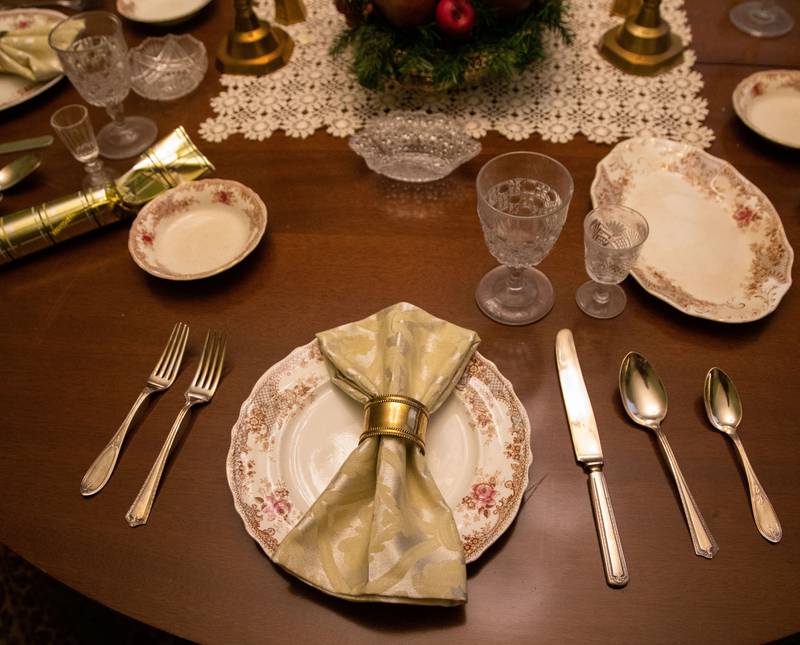 A traditional Victorian place setting sits on the table in the Dining Room of the 1892 Blodgett House during the Downers Grove Museum’s Merry & Bright: A Victorian Christmas event on Saturday, Dec. 10, 2022.