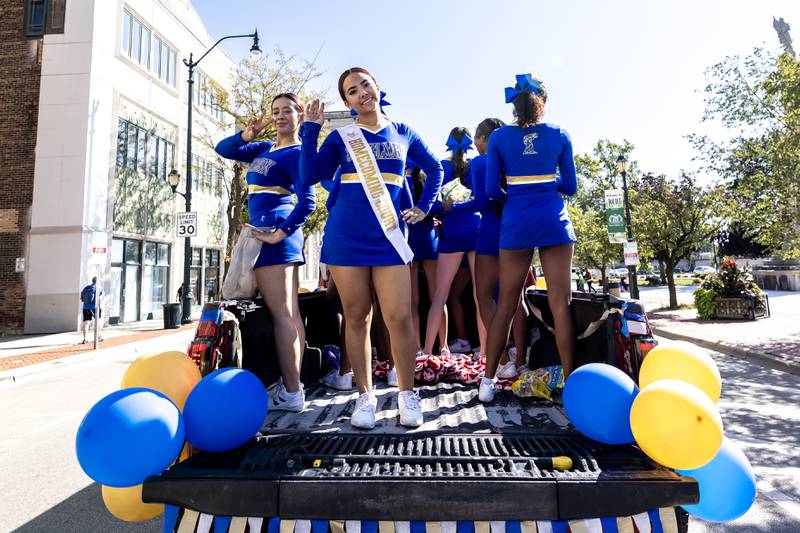 Members of the cheer team participate in the Joliet Central homecoming parade on Sept. 27. 2025.