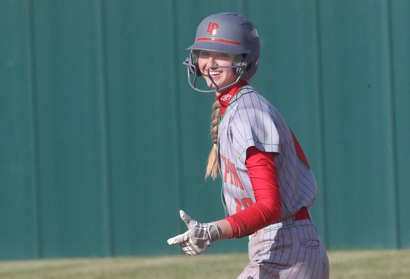 L-P's Kelsey Frederick gives a "thumbs up" sign to the bench after hitting a double against Morris on Monday, April 7, 2025 at the L-P Athletic Complex in La Salle.