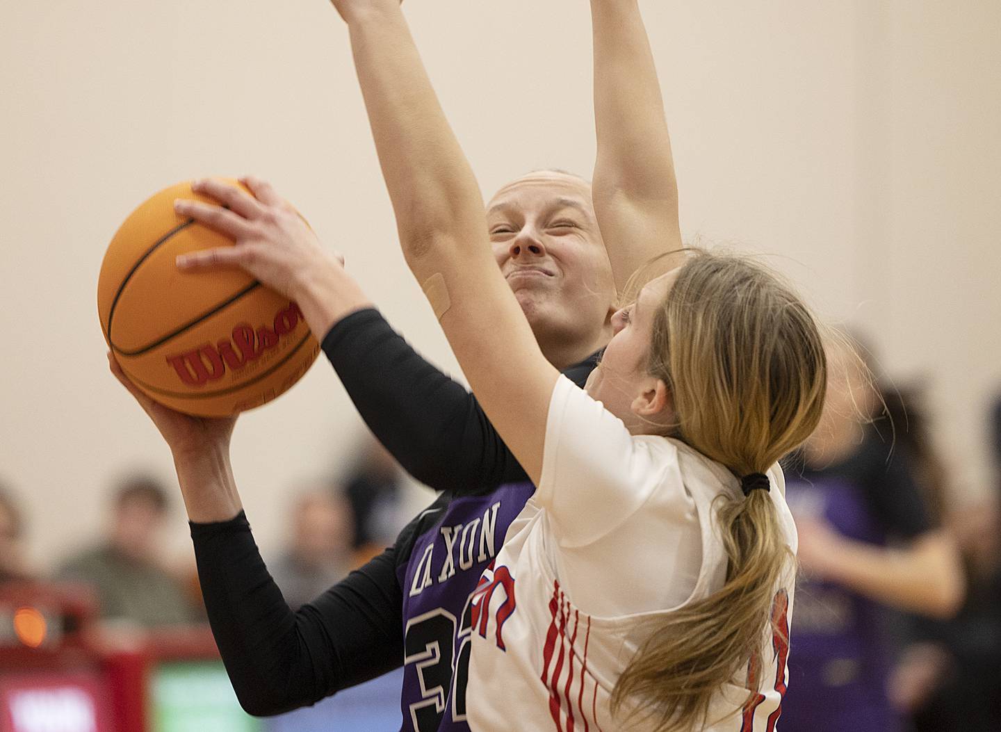 Dixon's Makenzie Toms works below the basket against Oregon’s Addison Rufer Thursday, Jan. 16, 2025, at the Blackhawk Center in Oregon.