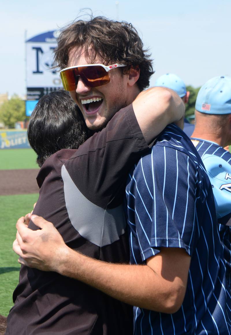 Joe Lewnard/jlewnard@dailyherald.com
Nazareth’s David Cox celebrates the Roadrunner’s 7-2 victory over Grayslake Central during the Class 3A  state championship baseball game in Joliet Saturday.