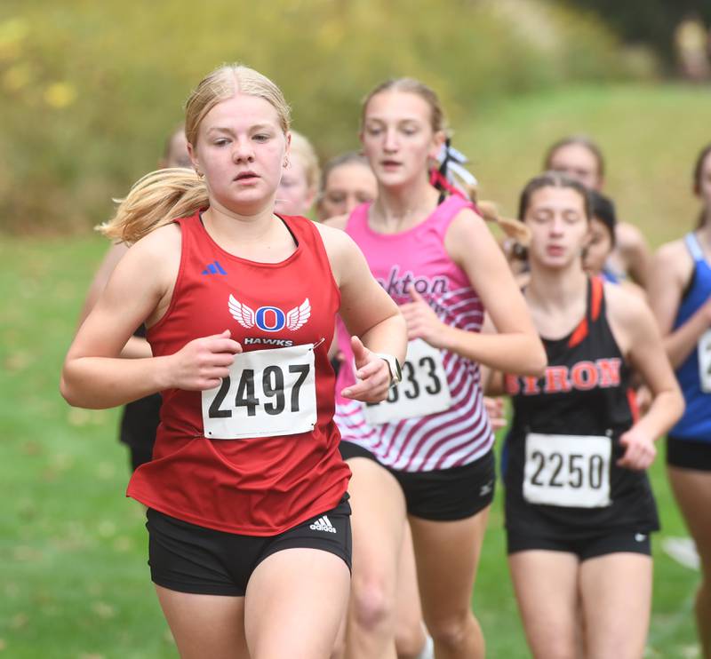 Oregon's Madeline Rodgers runs in the  the Amboy Columbus Day Cross Country Invitational at Shady Oaks Country Club near Amboy on Monday, Oct. 13, 2025.