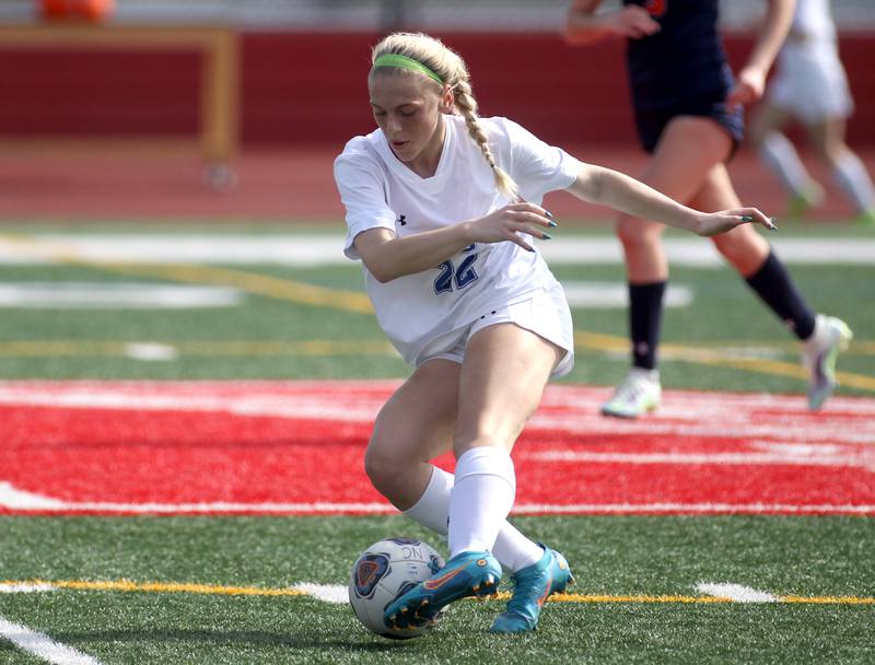 Geneva’s Morgan Rudowicz controls the ball during a Naperville Invitational game against Oswego at Naperville Central on Saturday, April 23, 2022.