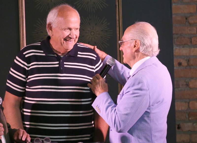 Former La Salle-Peru/IVCC boys basketball star Glen Mudge, is interviewed by emcee Lanny Slevin during the 2025 Shaw Media Illinois Valley Sports Hall of Fame at the Auditorium Ballroom in La Salle.