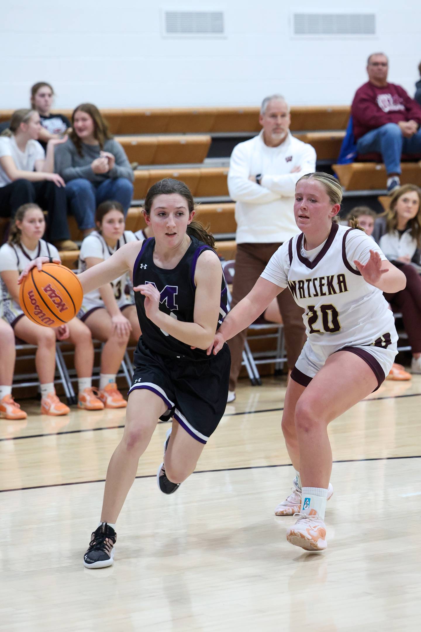 Manteno's Hannah Stritar drives against Watseka/Milford's Noelle Schroeder during Manteno's 57-52 victory on Wednesday, Jan. 21, 2026.