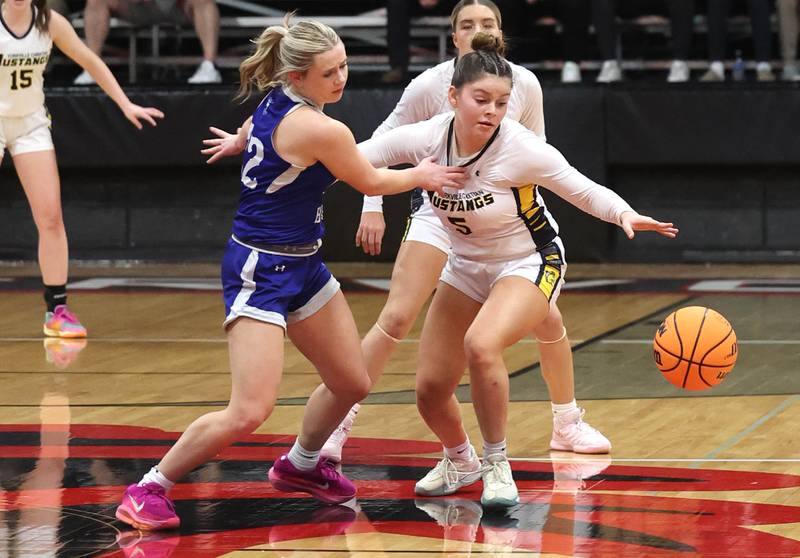 Hinckley-Big Rock's Anna Hermann (left) and Yorkville Christian’s Hannah Aguado go after a loose ball during their Class 1A regional game Tuesday, Feb. 17, 2025, at Indian Creek High School in Shabbona.