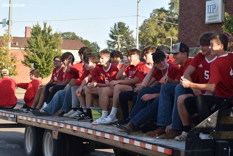 Streator High School soccer players ride Wednesday, Oct. 2, 2024, in the homecoming parade.