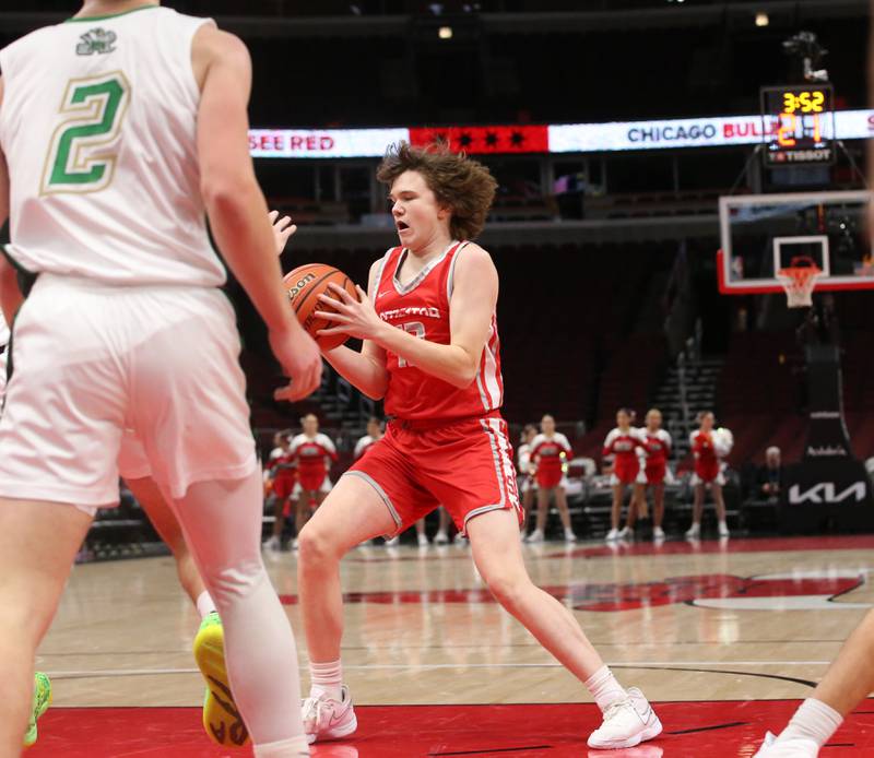 Streator's Nolan Ketcham looks to pass the ball as Seneca's Kenny Daggett closes down the lane during a game on Tuesday, Dec. 21, 2023 at the United Center in Chicago.