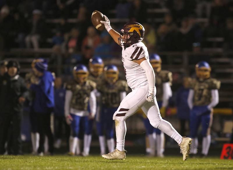 Richmond-Burton's Trace Mandel celebrates a blocked field goal during a Kishwaukee River Conference football game against Johnsburg on Friday, Oct.6, 2023, at Johnsburg High School.