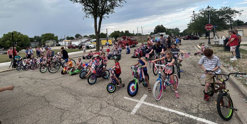 Kids line up for the start of the Let Freedom Ring Kiddie Parade on Saturday, July 5, 2025.