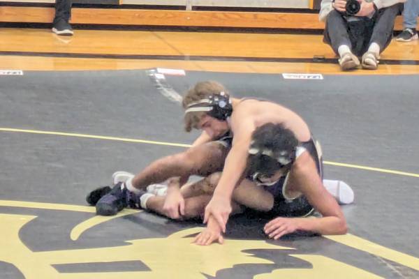 Football familiarity translates to wrestling win for Sycamore’s Adam Carrick; Spartans beat Rochelle
