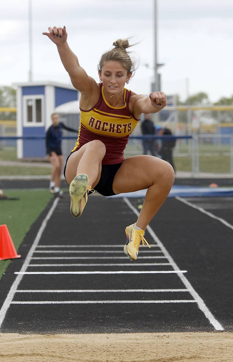 Richmond-Burton’s Sophia Komar competes in the triple jump during the IHSA Class 2A Johnsburg Girls Track and Field Sectional Meet on Wednesday, May 13, 2026, at Johnsburg High School.