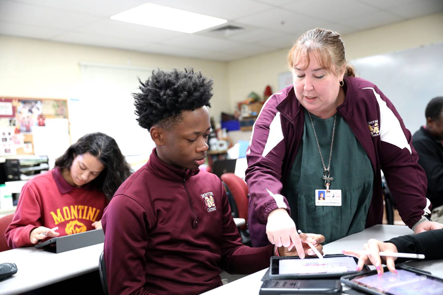 Montini math teacher Chrissy McManus teaches an honors algebra II class at the Lombard school. McManus is the staff sponsor of the Montini math team, who recently made history by bringing home the school’s first Illinois Council of Teachers of Mathematics Regional Championship trophy.