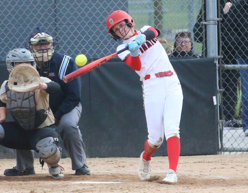 Ottawa's Teagan Darif hits a triple on this hit in the seventh-inning against Sycamore on Tuesday, May 5, 2026 at Peck Park in Ottawa.