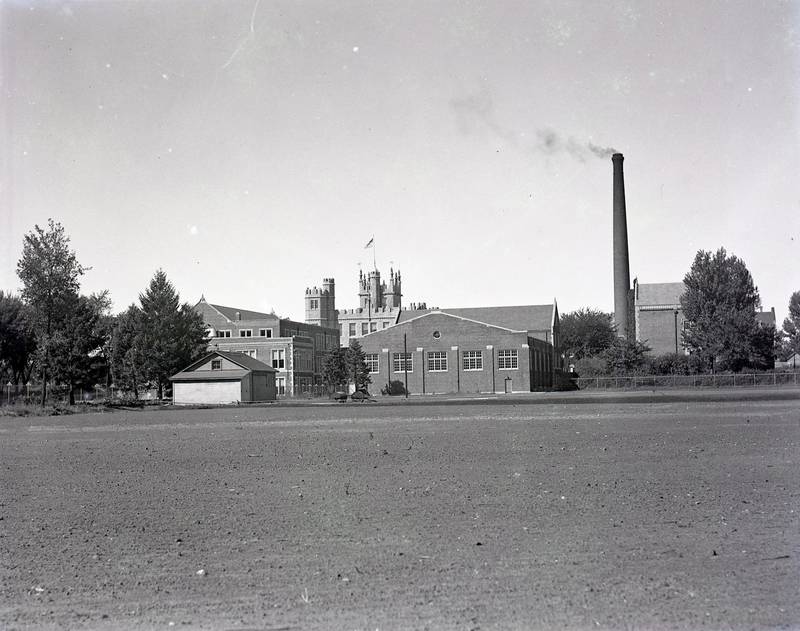 Northern Illinois State Teachers College looking west from Glidden Field, September 1937. The field was located at the site of today's NIU School of Art and Design and School of Music buildings.