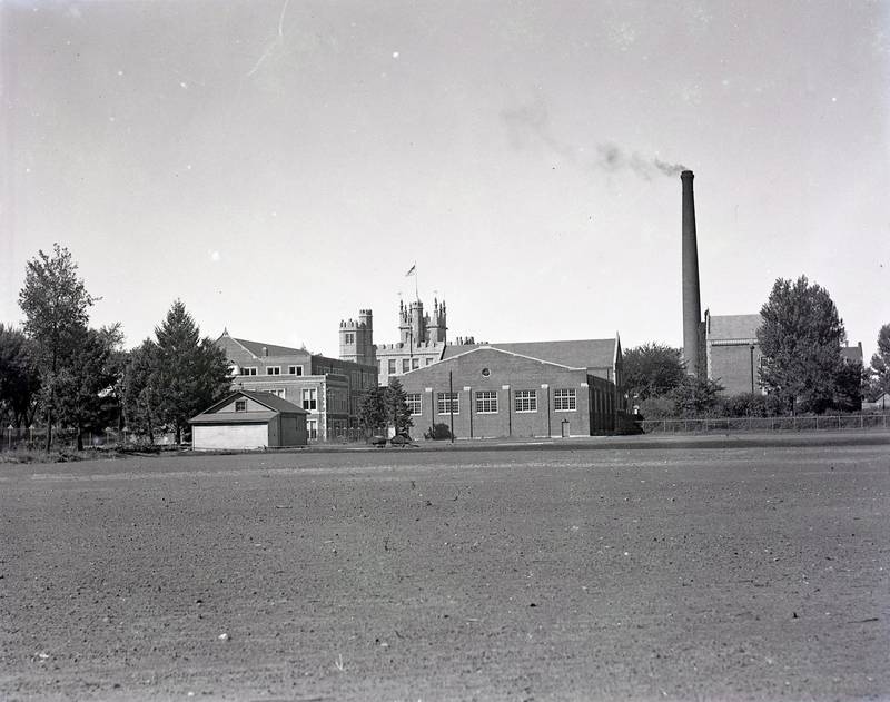 Northern Illinois State Teachers College looking west from Glidden Field, September 1937. The field was located at the site of today's NIU School of Art and Design and School of Music buildings.