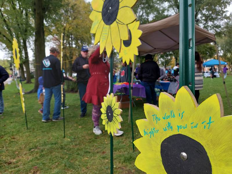 Hopeful messages were written on sunflowers during the Out of the Darkness Walk on Saturday, Oct. 14, 2023, at Washington Square in Ottawa.