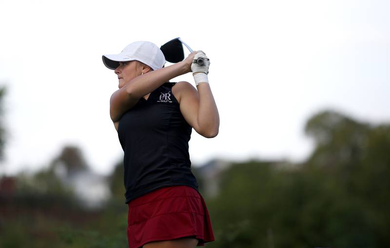 Prairie Ridge’s Grace Mertel tees off during the Class 2A Waubonsie Valley Girls Golf Sectional on Monday, Oct. 6, 2025 at Springbrook Golf Course in Naperville.