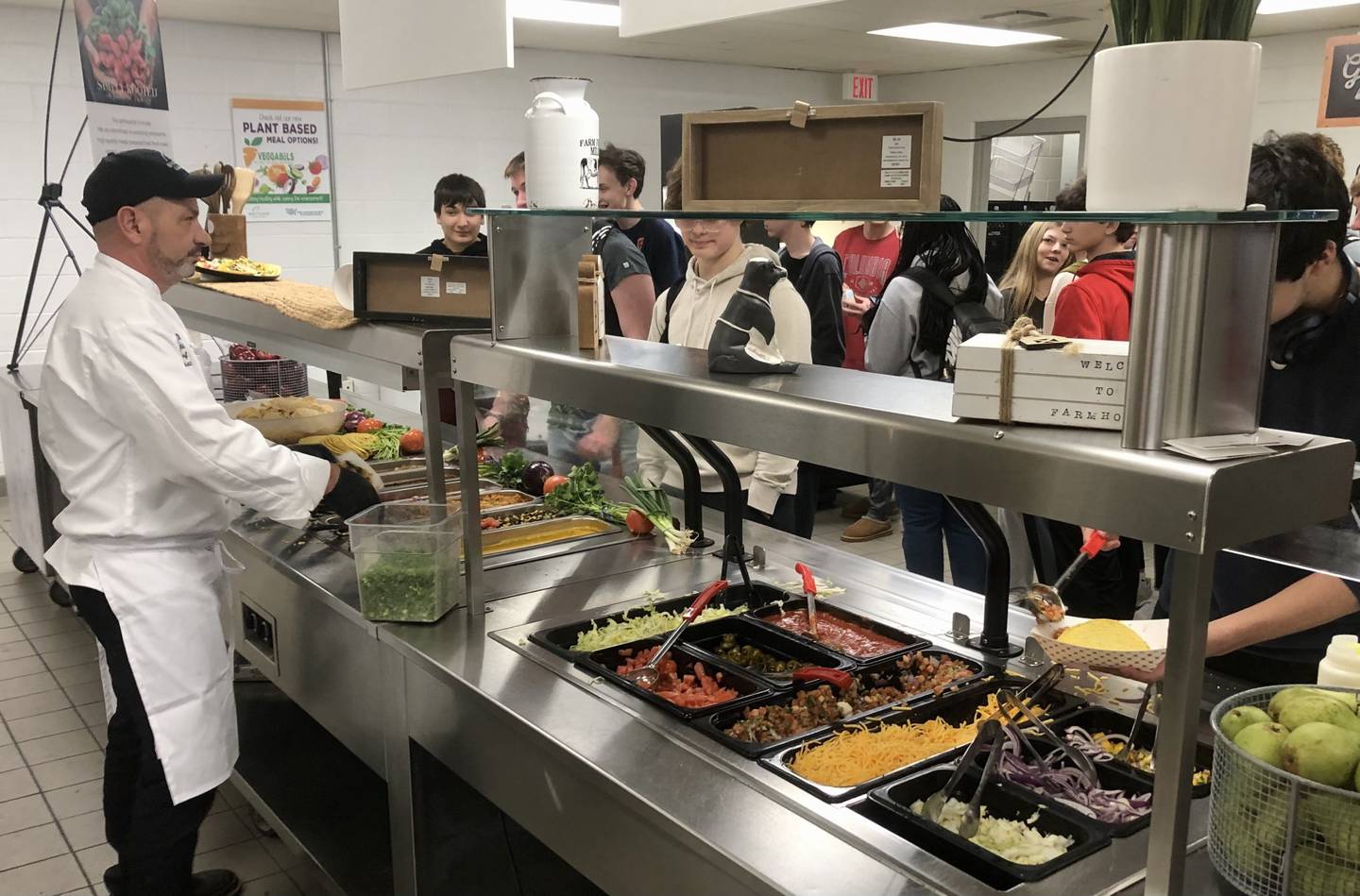 Chef Tony Distefano serves tacos to Yorkville High School students at a Feb. 9, 2024, pop-up event in the high school cafeteria at 797 Game Farm Road.